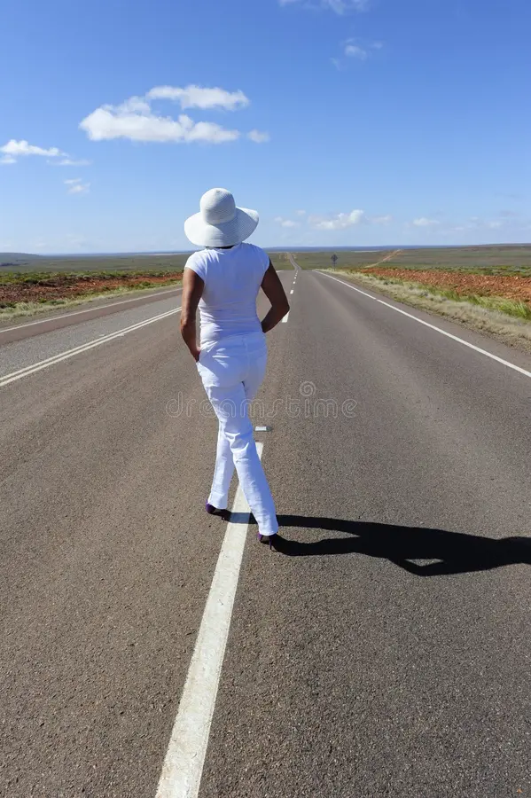woman-standing-highway-20109169
